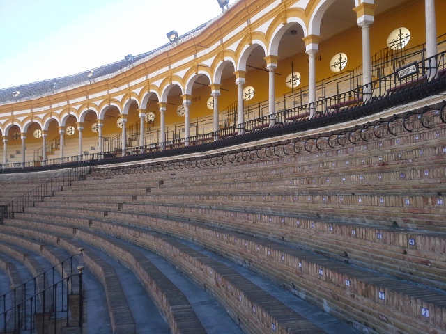 Patron seating are in Plaza de Toros in Seville Spain