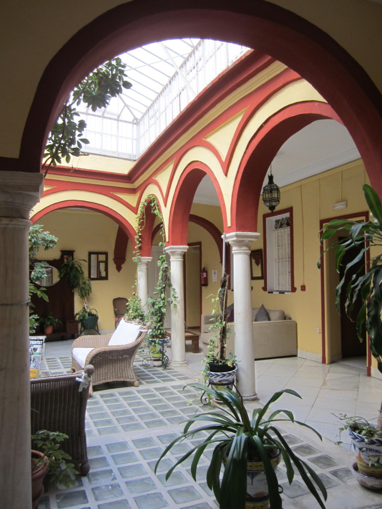 Atrium on the second level of Hostal Sierpes in Seville